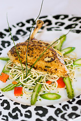 Image showing Roast Chicken Leg, asparagus, pasta