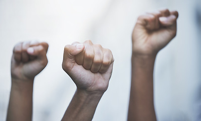 Image showing Fist hands to protest, rally and justice from government law, corruption and politics for freedom, power and human rights equality. Crowd of people fight for global revolution, change and stop racism