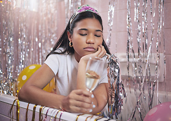 Image showing Birthday girl, sad and champagne while feeling bored, upset and disappointed while sitting alone in bathtub lonely and depressed. Unhappy, boring and abandoned woman during quarantine celebration