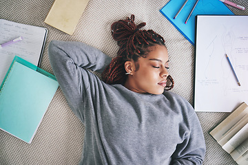 Image showing Student, sleeping and burnout with study books on house living room, home interior and bedroom floor. Top view of black woman, fashion designer or art university person tired after education learning