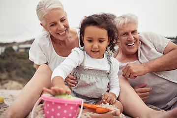 Image showing Senior family with girl playing in beach sand together for holiday, outdoor wellness and child development. Grandmother, grandparents care and love for baby or people relax on vacation or retirement