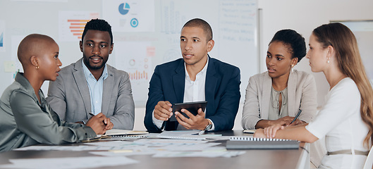 Image showing Leadership, planning and talking about ideas with marketing, advertising or finance team using tablet in corporate office. Business people together for collaboration, teamwork and project management