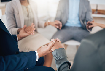 Image showing Business people holding hands in prayer, community trust and support in therapy, workshop and communication for mental health. Depression, anxiety or stress with employees or counseling in circle