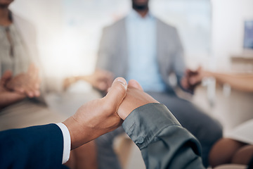 Image showing Hands in prayer, team building or group counseling holding hands for support, care and mental health help. Religion, faith and love community or business professional in a circle for psychology