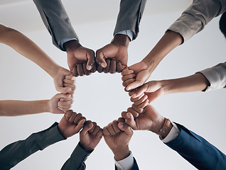 Image showing Team, motivation and support with hands fist bump of corporate partnership office workers. Work community, goal success and collaboration hand sign of business employee group teamwork together