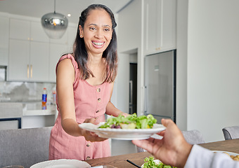 Image showing Wife, healthy food and salad while serving lunch or supper for husband with a smile at home. Caring and happy housewife woman with a dinner plate and enjoying a vegan meal at the table together