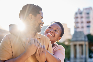 Image showing Sun, flare and love for couple happy on outdoor romantic date to bond, relax and enjoy fun time together. Black woman and man with peace, hug and freedom while travel in Rome for holiday adventure