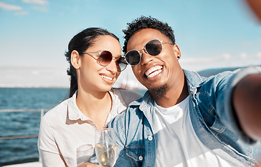 Image showing Couple selfie on yacht in ocean celebrate with champagne on vacation or holiday in summer. Happy young man with luxury wine, cruise at sea with woman for celebration or honeymoon travel on ship