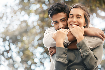 Image showing Couple hug, nature date and smile for love in summer, happy in park and affection with green trees in background with bokeh in garden. Face portrait of man and woman hugging in city spring