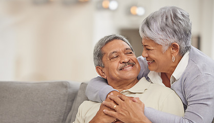 Image showing Relax, retirement and senior Mexico couple on sofa at home enjoying free time with smile, hug and love. Happy, comfortable and relationship of elderly man and woman on couch in living room together