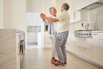 Image showing Senior couple dance, kitchen and elderly love of people spending quality time together at home. Happy retirement of a woman and man from Mexico dancing in their house with a smile and happiness