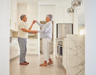 Image showing Mature couple dancing at home together for love, relax and romantic fun day. Happy husband, smile wife and intimate partners bonding in playful marriage, special dance moment and care relationship