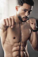 Image showing Fitness, boxing man and punch for body goal motivation in health, wellness and sports gym for exercise, training or energy workout. Strong and power portrait of athlete in fight in cardio competition