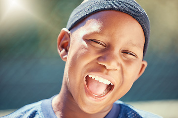 Image showing Fitness, a smile on face and a black child on basketball court in summer. Game, sport and happy healthy kid outside on school sports ground. Exercise, wellness and fun, boy playing in the sun in park