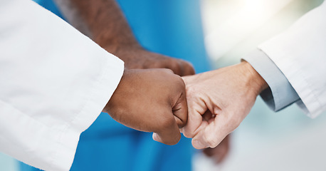 Image showing Fist bump hands, healthcare teamwork and group support for medical goals, collaboration and mission. Closeup doctor group motivation, partnership and success celebration for medicine solidarity trust