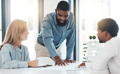 Image showing Teamwork, planning and coaching with a business man talking to his team in a meeting for strategy and development. Collaboration, workshop and training with staff working together on a group project