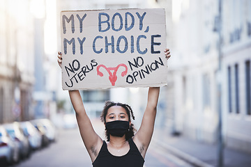Image showing Freedom, protest and abortion with a woman and a poster, fighting for human rights and gender equality. Justice, change and banner in the hands of a young female marching for social justice
