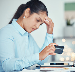 Image showing Confused woman and finance debt on credit card for invoice payment in mental panic at desk. Stressed and anxious entrepreneur girl with bankruptcy loan crisis sad about failure of business.