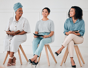 Image showing Global women, diversity and company business meeting with digital tablet, notebook and paper documents. Smile, happy and inclusive teamwork collaboration in office innovation and brand strategy idea