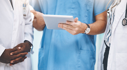 Image showing Teamwork, healthcare and doctors planning on digital tablet, sharing advice and checking online schedule in a hospital. Communication, strategy and innovation closeup of health experts sharing vision