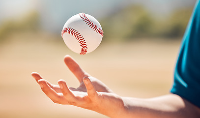 Image showing Sports athlete catch baseball with hand on playing game or training practice match for exercise or cardio at stadium field. Young man, fitness and softball athlete with successful strong pitching arm