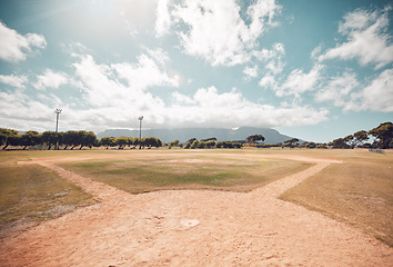 Image showing Empty baseball field, stadium or sport softball park for competition, training or tournament match. Sports, ball game or exercise, recreation or grass lawn nature area with pitch circle blue sky view