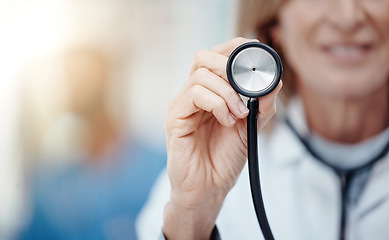 Image showing Hand of professional doctor with stethoscope for medical healthcare lab test results in cardiology and medicine. Hospital innovation, research and consulting in pharmacy help with heart rate problem