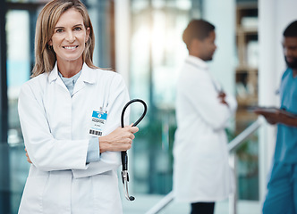 Image showing Cardiology, stethoscope and proud doctor in portrait for medical wellness, trust and innovation with lens flare. Hospital executive healthcare worker woman smile for career motivation or heart health