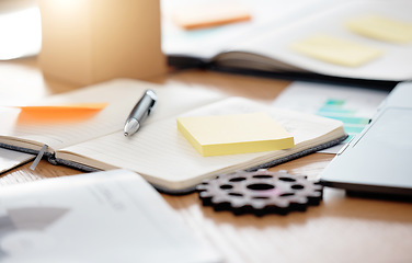 Image showing Table, paperwork and sticky note planning, strategy and brainstorming notebook at an office. Business work desk of gadgets for scheduling, ideas and writing notes for project data and information