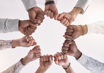 Image showing Hands, teamwork and fist for business meeting support, motivation and success of global market strategy startup company. Collaboration, target goal and mission of corporate is diversity and job trust