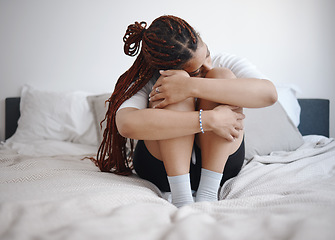 Image showing Depression, anxiety and sad woman on bed with a mental healthy problem. Suicide, depressed or insomnia and young girl crying, heartbroken or stress in her bedroom for fail, mistake or fear