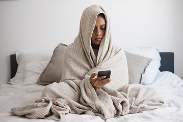 Image showing Depression, anxiety and woman texting in bed, reading online social media bullying post, feeling alone in bedroom. Mental health, fear and sad female looking unhappy, vulnerable in emotional crisis