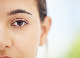 Image showing Woman, eye and vision of face in focus for healthy life and sight against a blurred background. Closeup of female facial macro eyesight in healthcare for market advertising for optician treatment