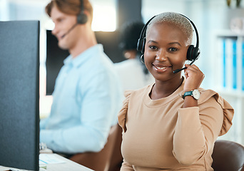 Image showing Call center, customer service and support consultant working in a busy office, friendly help with happy woman. Portrait of relax female consulting with online client, enjoying career and workplace