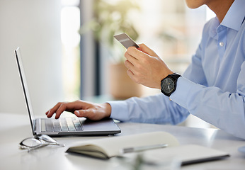 Image showing Hands, laptop and credit card with a business man or accountant working in finance or banking online. Accounting, ecommerce and and shopping with a male employee at work by a desk in the office