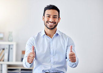 Image showing Thumbs up, work success and business man in support of startup company, management thank you in office and happy with corporate goal. Portrait of Asian worker with agreement hand sign for career