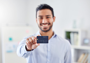 Image showing Hand, smile and businessman with credit card for finance, bank and money payment in a work office. Portrait of happy corporate employee able to buy or pay bills, retail shopping or debt with salary