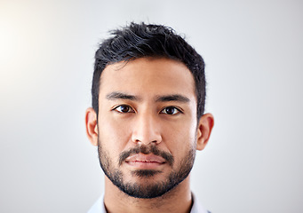 Image showing Business man, portrait and serious face expression with studio background for copy space with flare. Corporate person with thinking, focus and doubt facial look for dilemma or concentration.