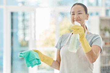 Image showing Housekeeping, products and happy woman cleaning the windows with detergent, cloth and gloves. Maid, cleaner or domestic worker washing the dust and bacteria off the glass in an apartment building.