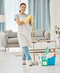 Image showing Cleaning floor, house work and woman working in home service mopping living room, doing job with smile and happy to clean house apartment. Portrait of Asian cleaner or housewife housekeeping