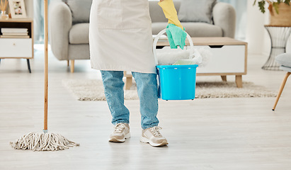 Image showing Legs of home cleaning woman with house equipment, mop and bucket for floor hygiene, dust and dirt. Girl, cleaner or worker doing interior house cleaning service with living room cleanliness detergent