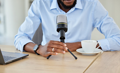 Image showing Influencer and businessman recording a podcast while talking over a microphone for his live streaming talk show. Blogger using audio equipment and doing a live radio broadcast