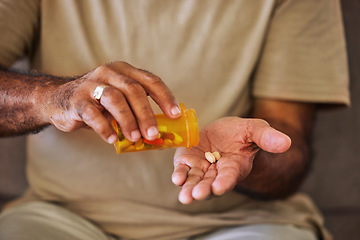 Image showing Medicine, healthcare and pills in the hands of a senior man sitting on a sofa in the retirement home. Prescription, medication and antibiotics for chronic treatment and wellness with a pensioner