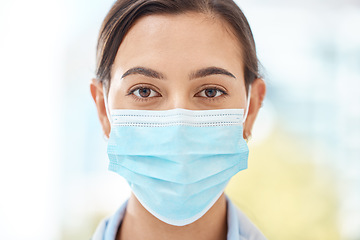 Image showing Covid, face and mask for clean hygiene with a woman staying safe and wearing protection against coronavirus while standing. Closeup of female following safety regulations for virus during pandemic