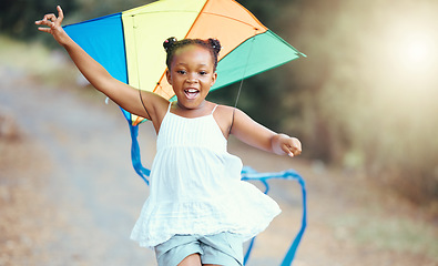 Image showing Nature, summer and girl with a kite running in a park with a smile. Weekend, happiness and a little black child having outdoor fun. Freedom, development and growth for happy young kid playing outside