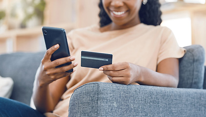 Image showing Black woman, online shopping and ecommerce phone payment on credit card, mobile money and internet finance on home sofa. Closeup of happy african person, cellphone banking and easy fintech technology