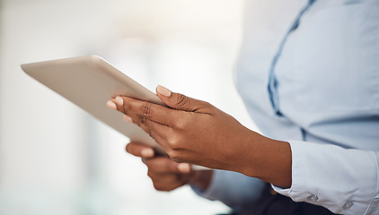 Image showing Hands of business woman working on a tablet analyzing annual company data or information for marketing campaign. Professional black girl with digital mobile tech for research on consumer sales trends