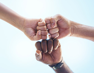 Image showing Fist bump, teamwork and friends in support, motivation and trust work together for success, partnership and diversity outdoor. Hands of people in collaboration, reunion and connection for unity goal