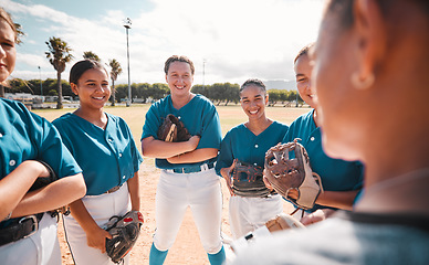 Image showing Team of women baseball players, given strategy and motivation by coach to win game. Winning in sport means leadership, teamwork and pride as well as healthy competition for group victory in softball