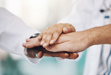 Image showing Unity, teamwork and hands of medical doctors together to support each other in hospital. Diversity, medicine and group of professional healthcare workers in celebration of success or team motivation.